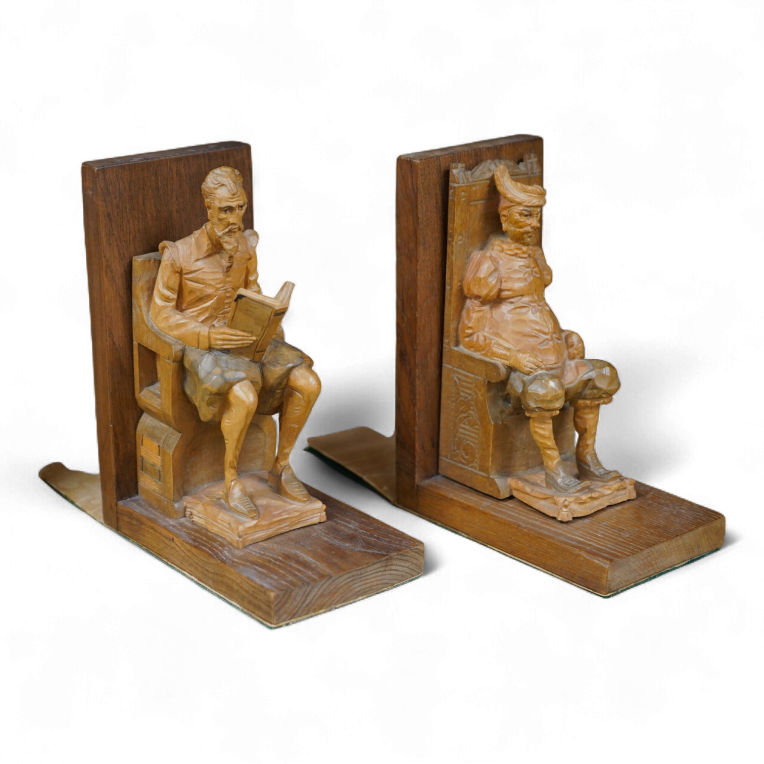 A pair of Bavarian carved wood figural bookends, 17cm high
